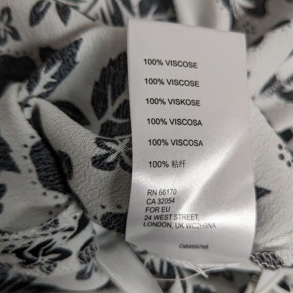 Urban Outfitters Dress Mini Backless Peep Hole Short Sleeves Ties on Back B&W XS - Picture 9 of 9